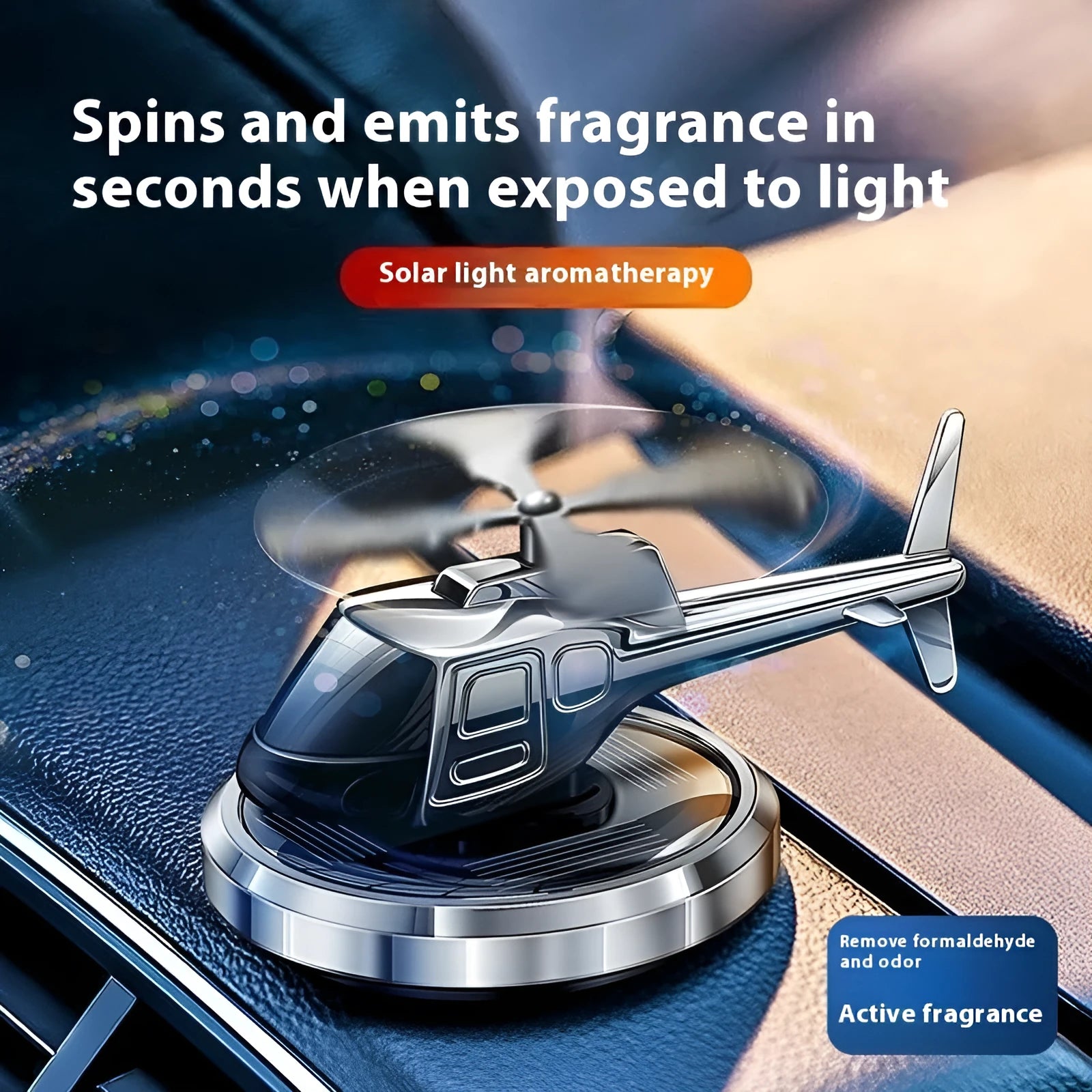 Silver metal solar helicopter car perfume ornament with rotating blades on car dashboard