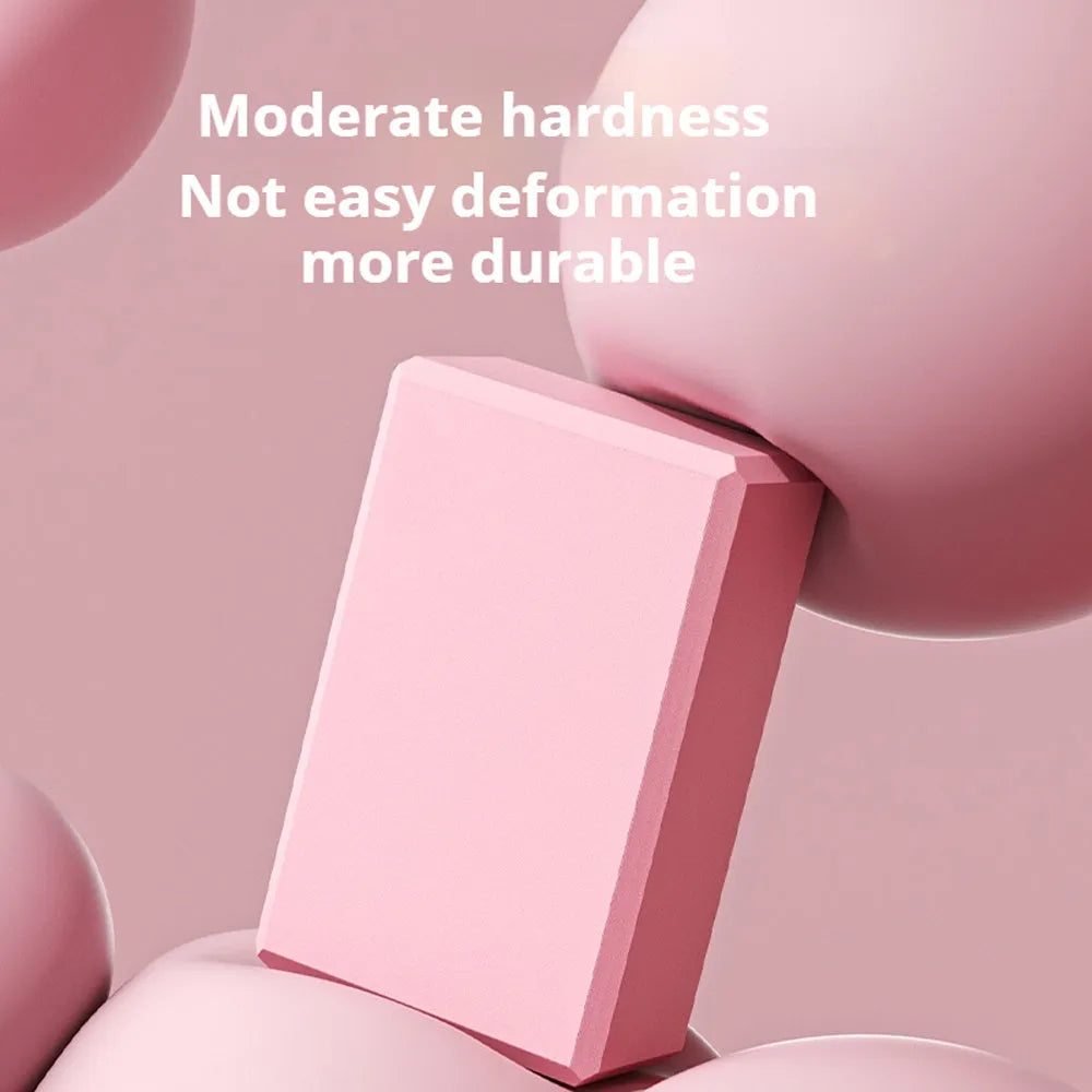 Solid colour EVA foam yoga block with hexagonal sides and ridges for grip