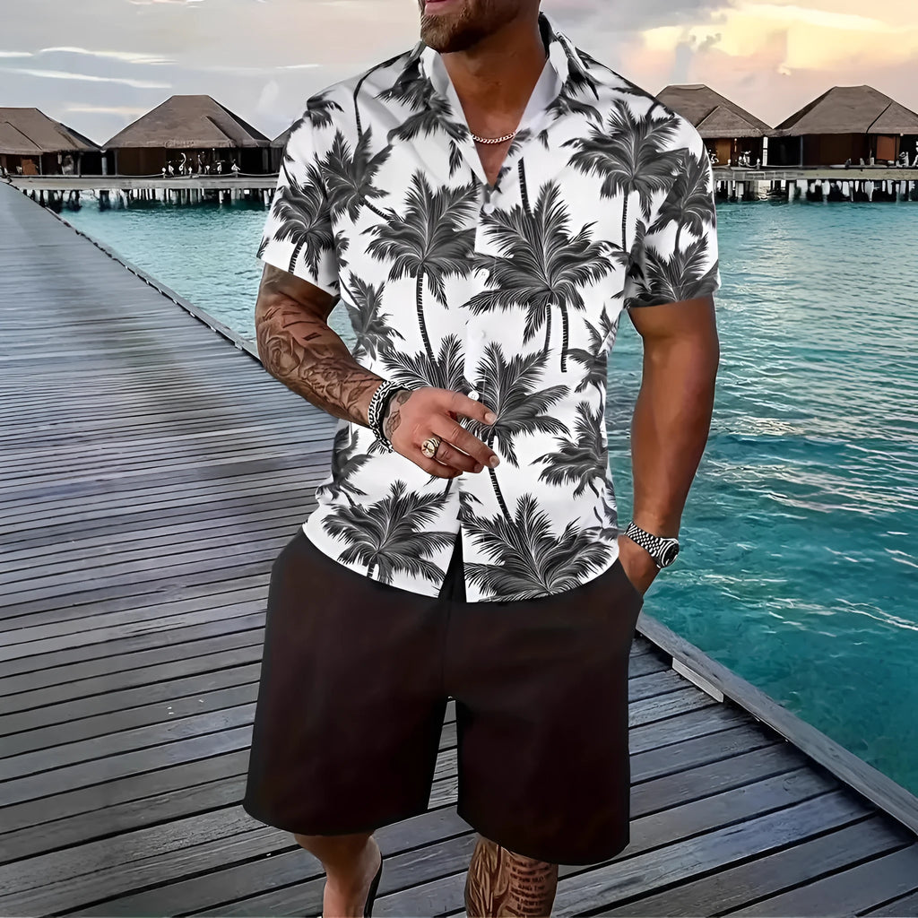 Man wearing a colourful 3D printed Hawaiian shirt and matching shorts casual set.