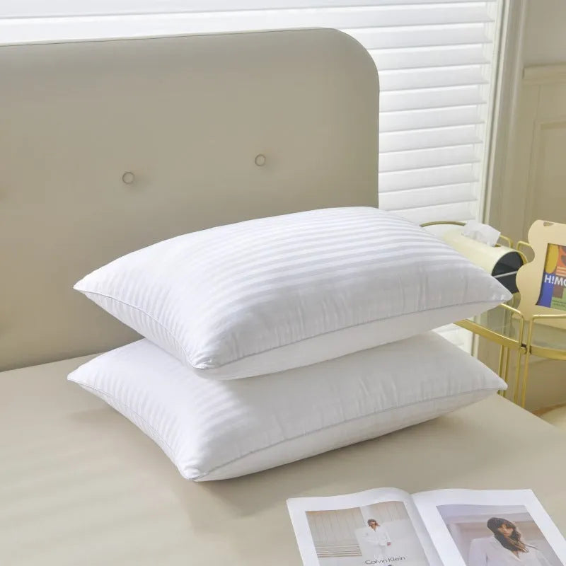 White cotton satin stripe pillow with feather cotton filler, shown in standard bedding size.