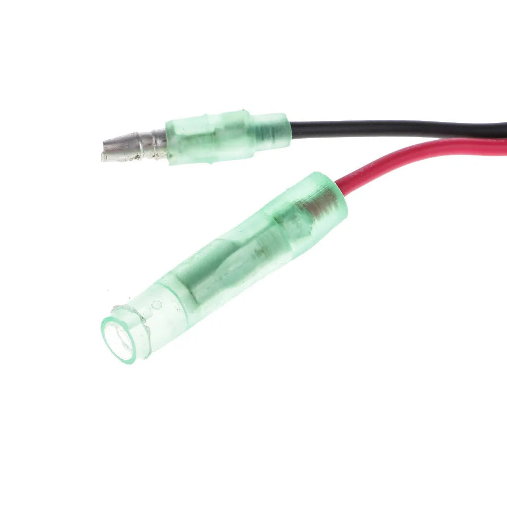 Yamaha outboard motor kill switch with coiled plastic and metal lanyard for engine safety.