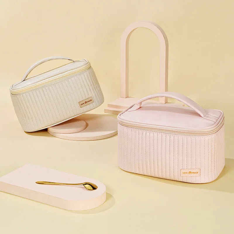 Open-top PU leather makeup bag in beige colour showing wide-mouth design for easy access