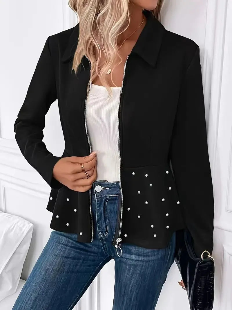 Women's black loose fit coat with heavy-duty zipper and beaded ruffled hem detail