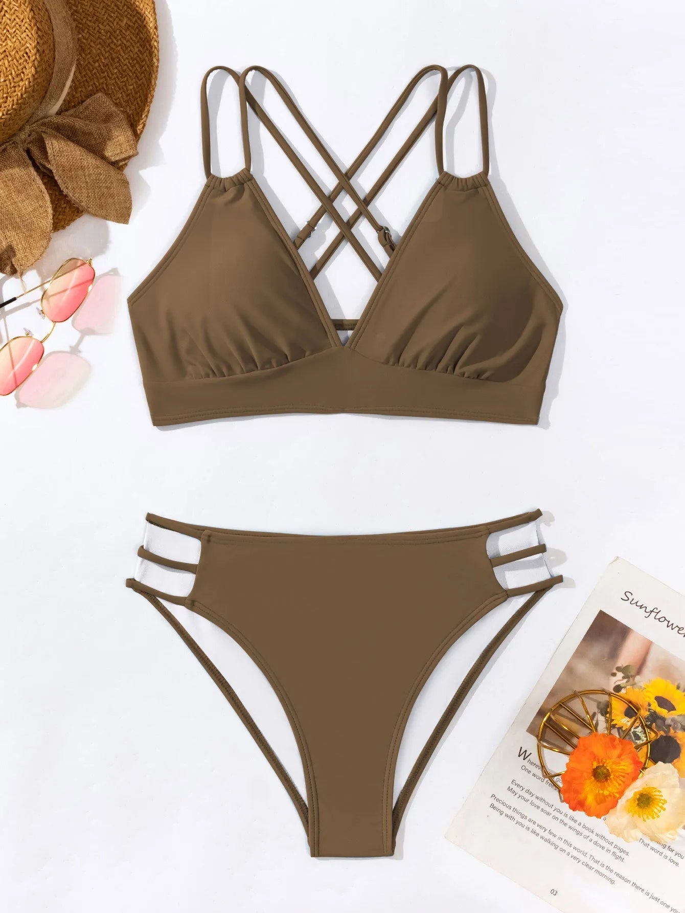 Women's black halter V-neck bikini top and matching split-style swim shorts.