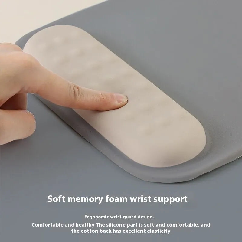 Ergonomic mouse pad with built-in wrist rest in various colour options on a desk