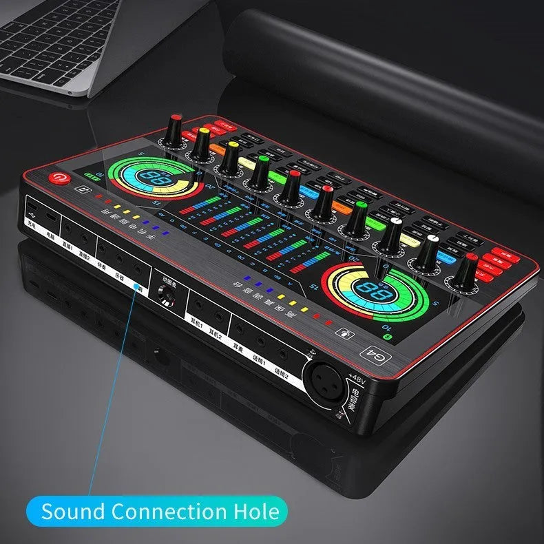 G4 professional sound card set with mixer, large diaphragm microphone, remote control, and audio cables on a desk.