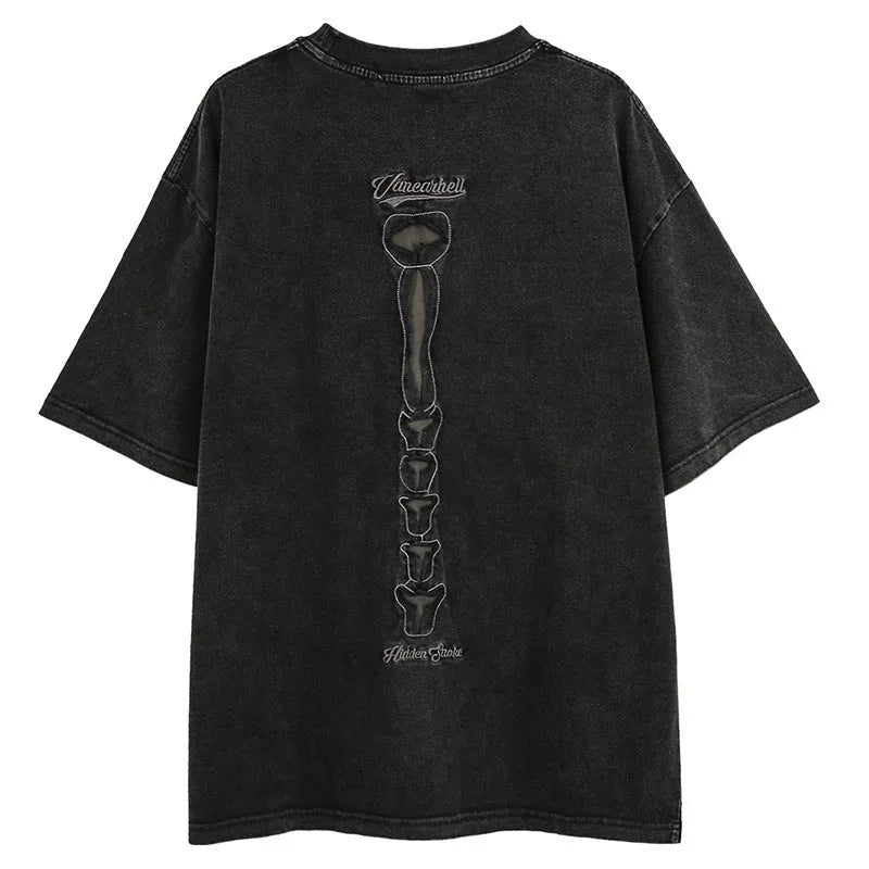 Black loose fit cotton t-shirt featuring a large skull and letter graphic print on the front.