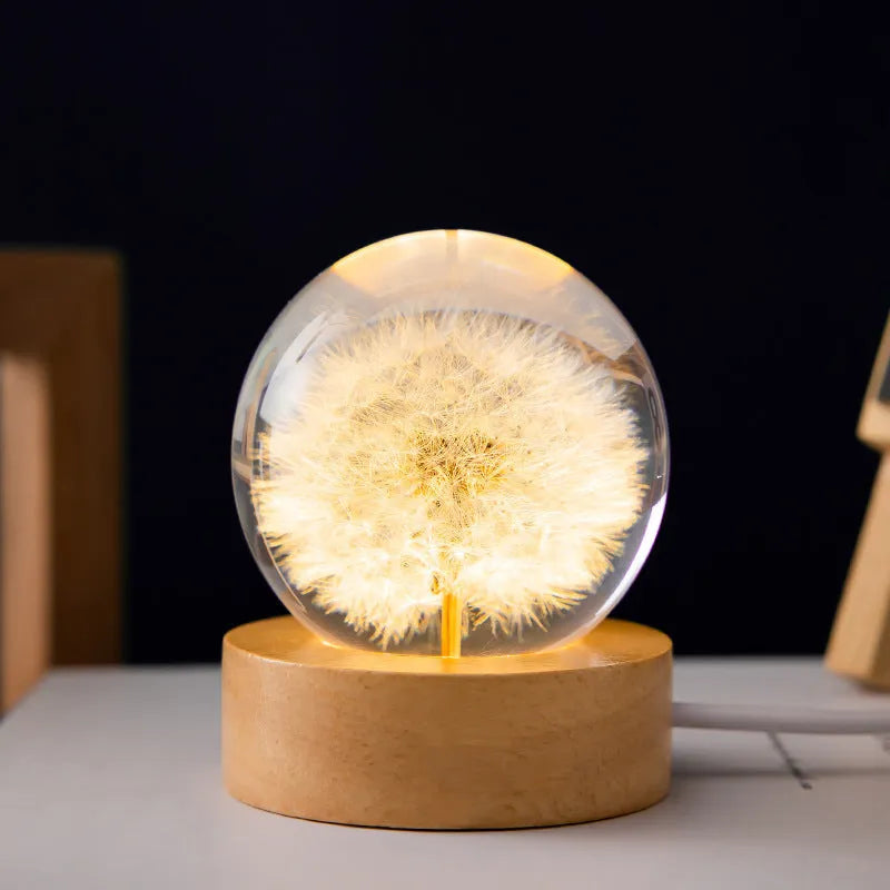 3D dandelion crystal ball night light on beech wood stand, showing 60mm resin sphere with internal flower.