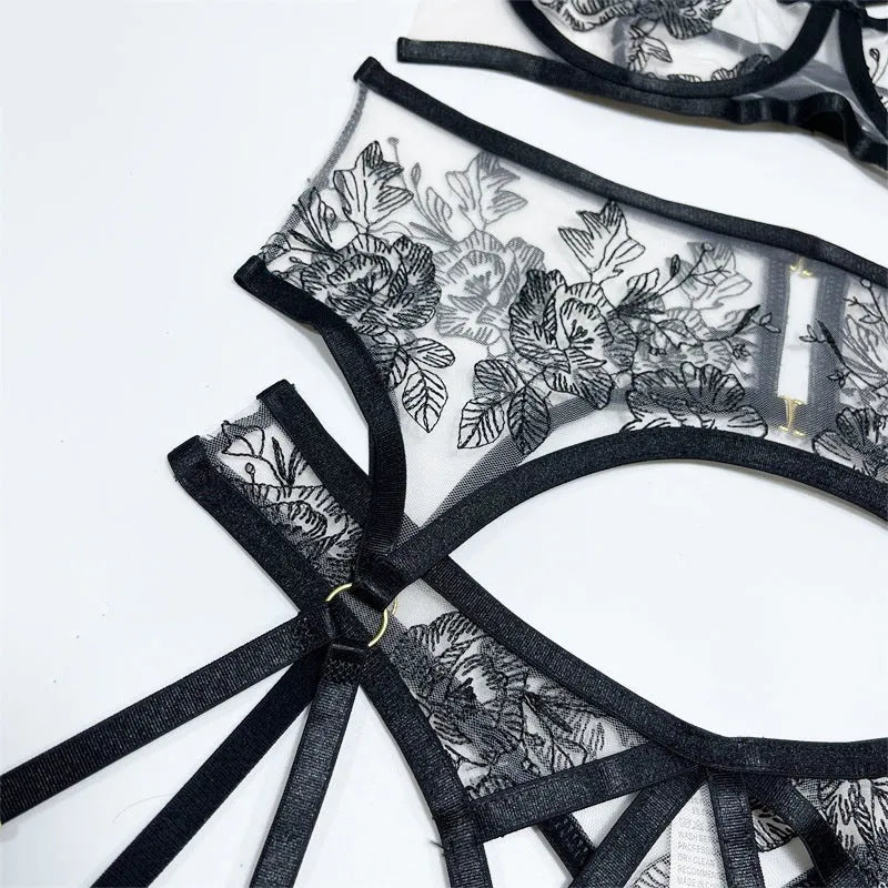 Black lace mesh women's three-piece set with floral print, showing top, trousers, and waist ring.