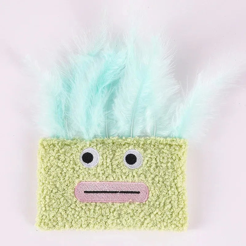 Colourful catnip plush toy with a big mouth explosion head shape in soft fabric