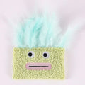 Colourful catnip plush toy with a big mouth explosion head shape in soft fabric