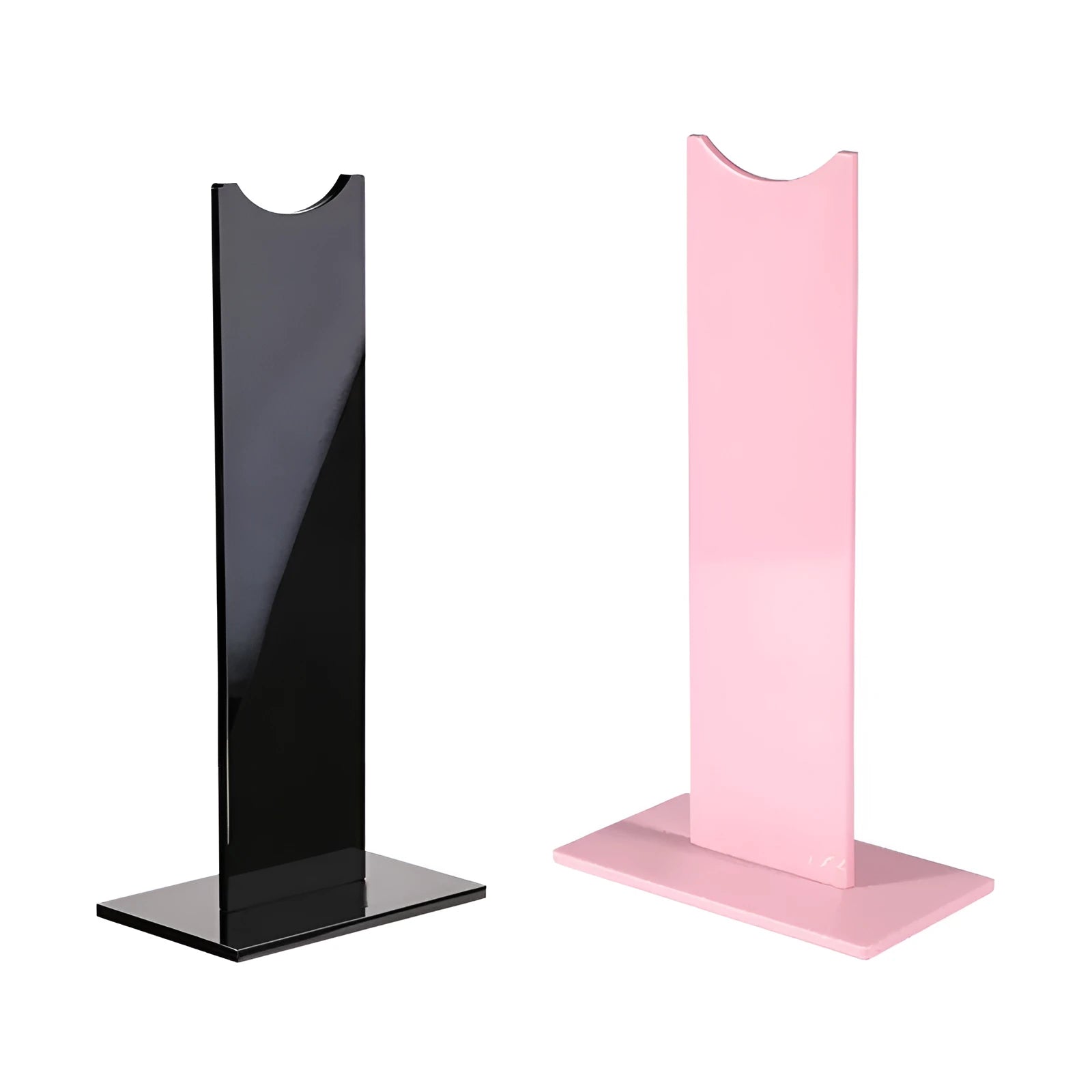Black detachable head-mounted gaming headset stand with a silicone base on a wooden desk.