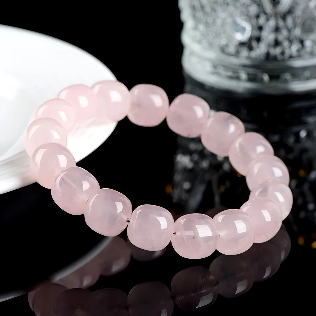 Pink crystal barrel bead bracelet with 11-12mm geometric beads and original design