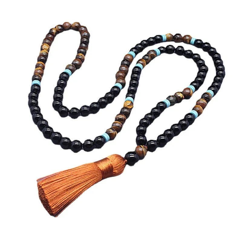 Black agate jewellery set showing tiger-eye stone necklace and geometry bead bracelet