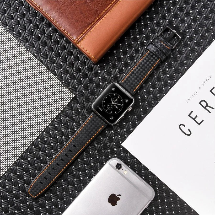 Leather Apple Watch strap with carbon fibre pattern case in black, blue, orange, and red colour options