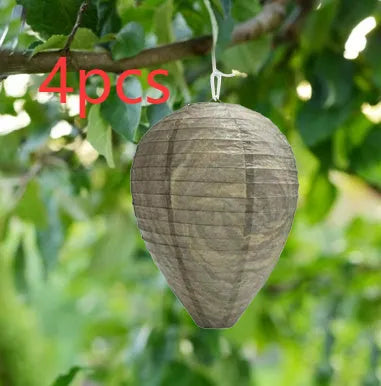Paper and wire beehive lantern with honeycomb structure, 22 cm wide by 28 cm high.