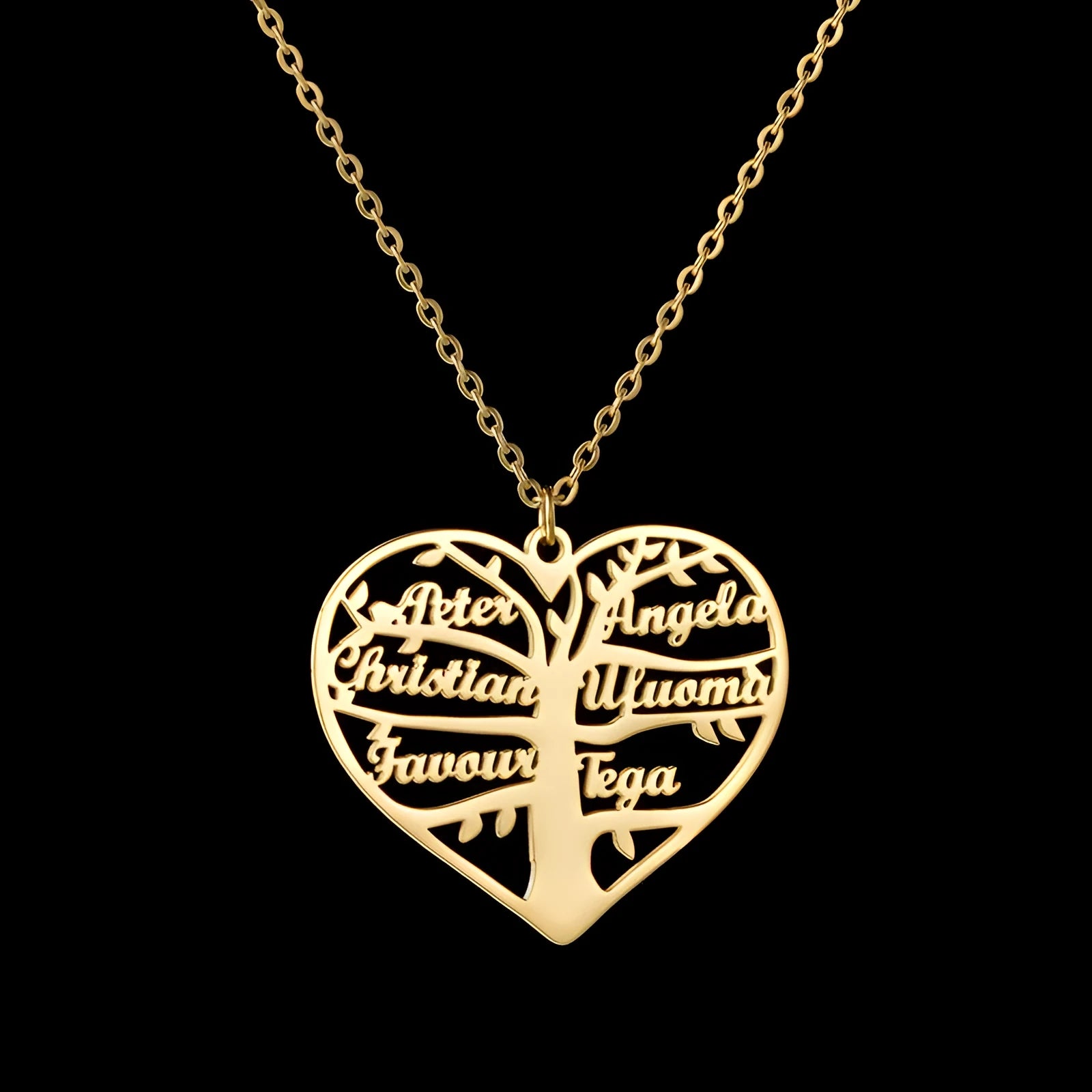 Personalised women's stainless steel necklace with a hollow heart and tree pendant engraved with names, shown on a model.