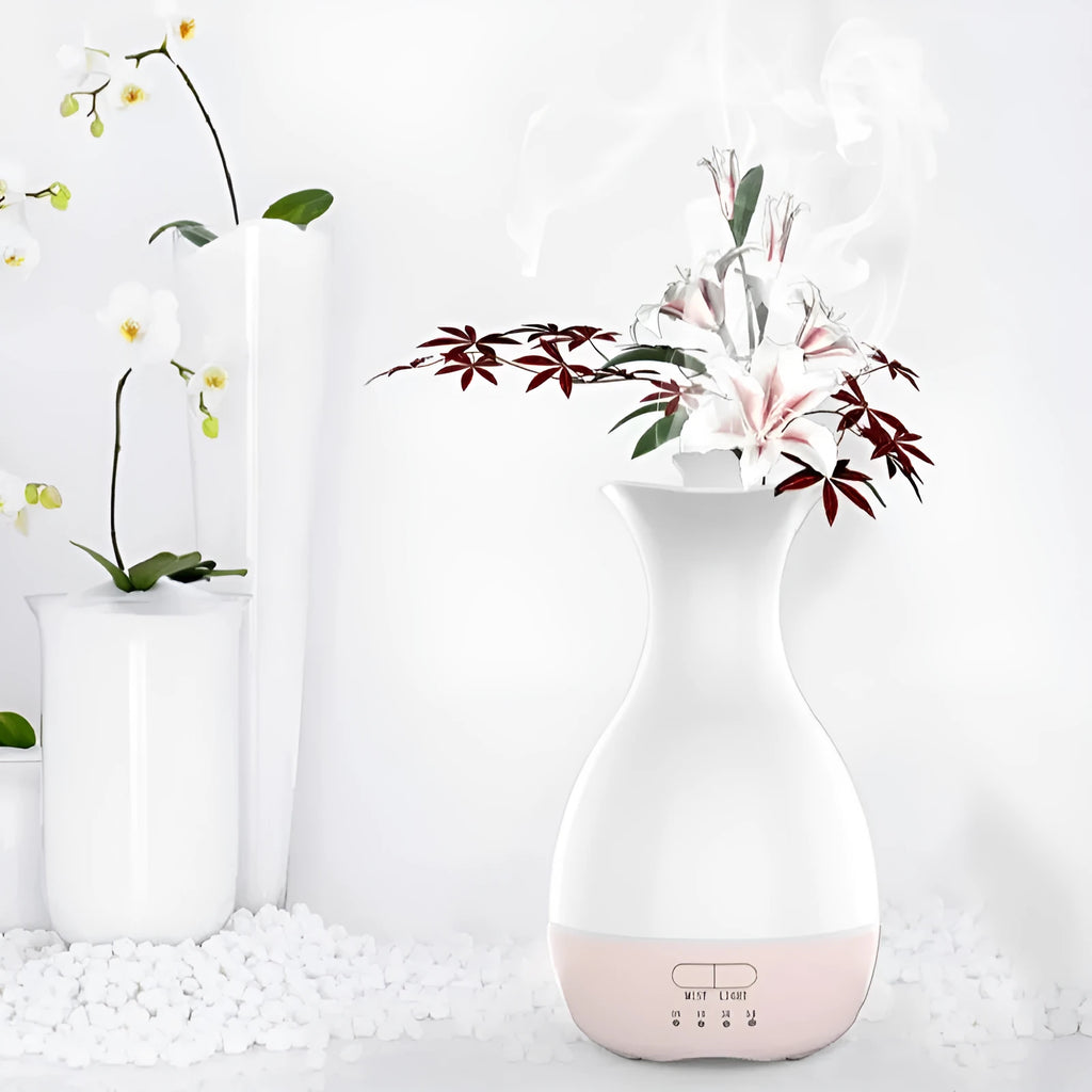 White or pink ultrasonic essential oil diffuser with 200ml tank, night light, and control buttons.