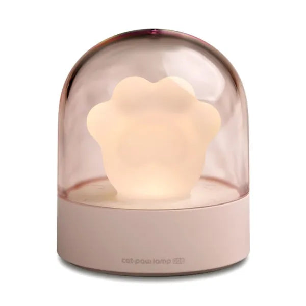 Cat paw-shaped night light with music box function showing pink colour option with illuminated soft light
