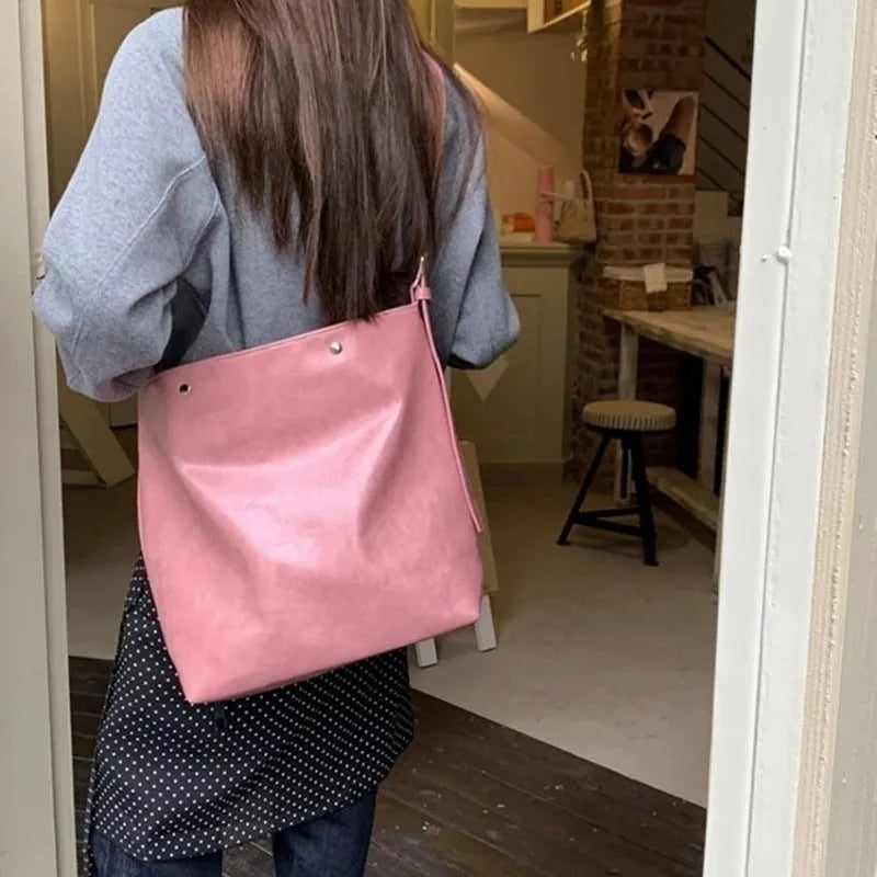 Corduroy one-shoulder commuter bag in pink or brown colour with PU lining