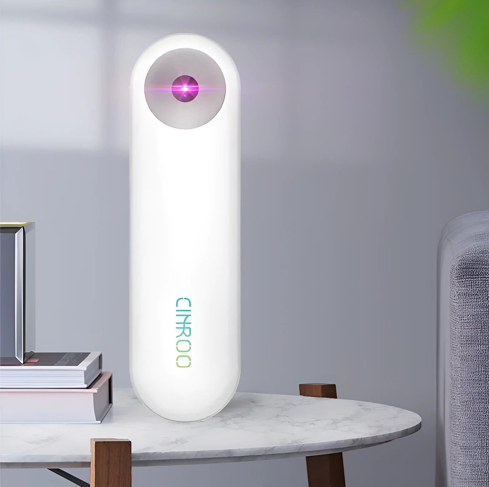 White portable UV sterilizer lamp showing compact size for personal disinfection use.