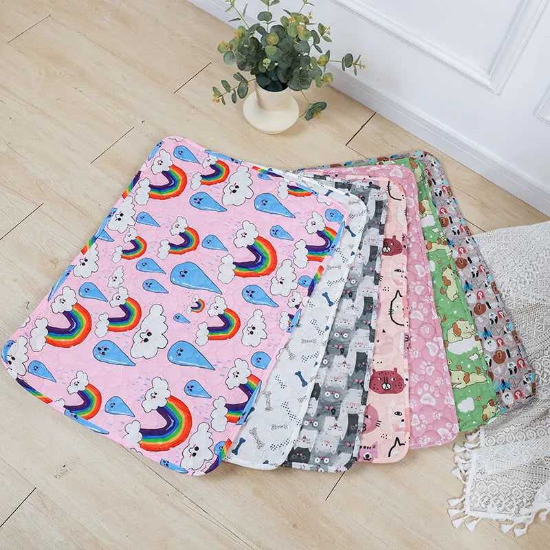 Reusable washable pet urine pad with colourful animal print design and waterproof backing.