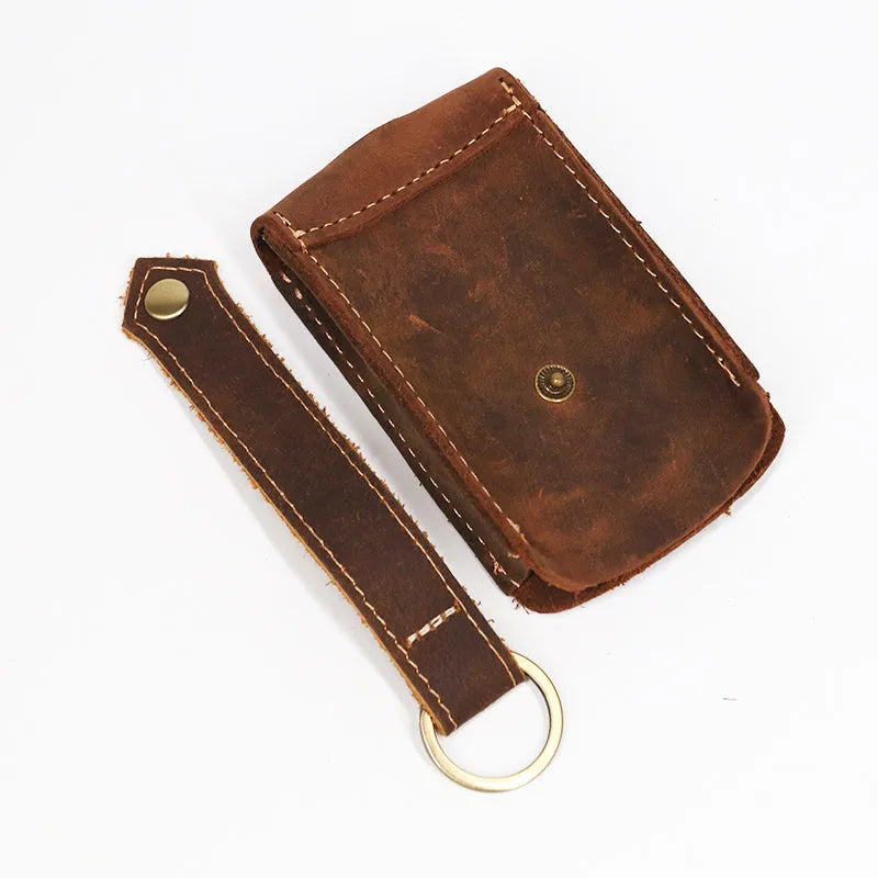Crazy Horse leather key case in dark brown with keys inserted, measuring 7 cm by 11.5 cm