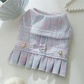 Polyester pet clothes for cats and small dogs in purple and pink colours showing four size options
