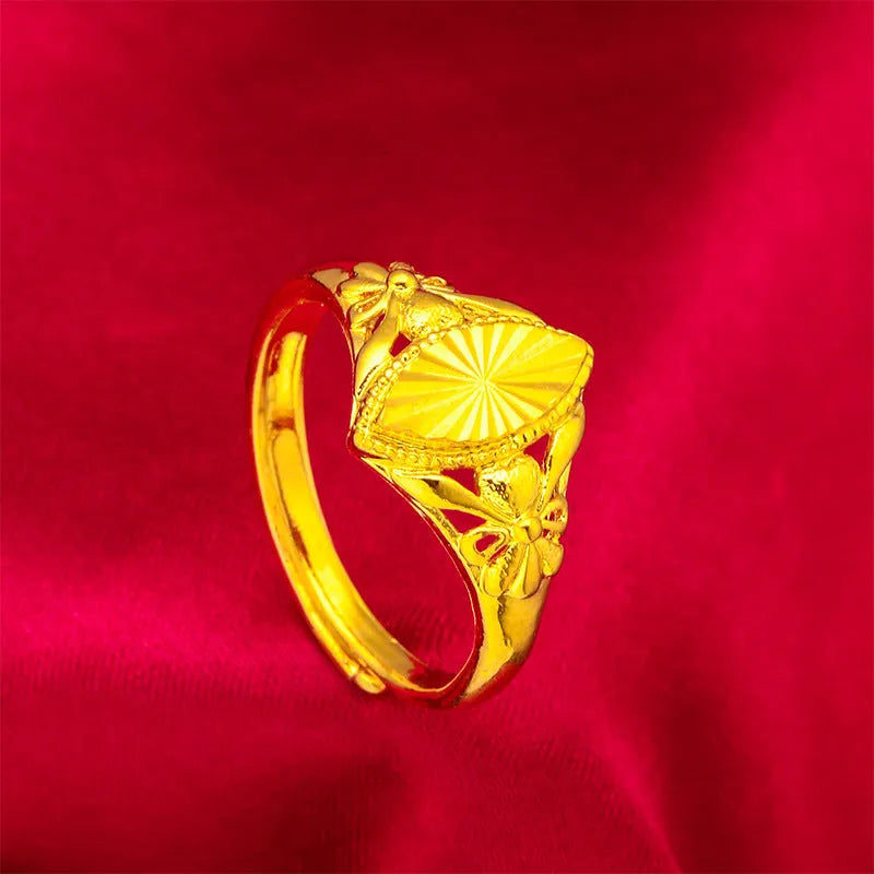 Gold geometric open flower ring with textured surfaces, brass construction with electroplating
