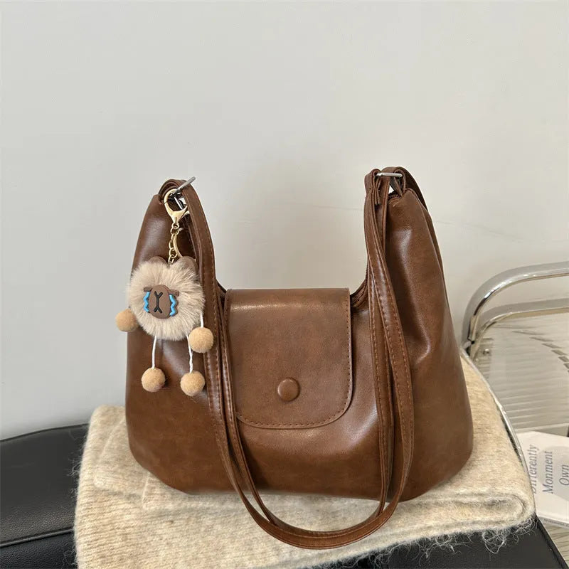 Textured PU leather women's shoulder bag in horizontal square design with single strap
