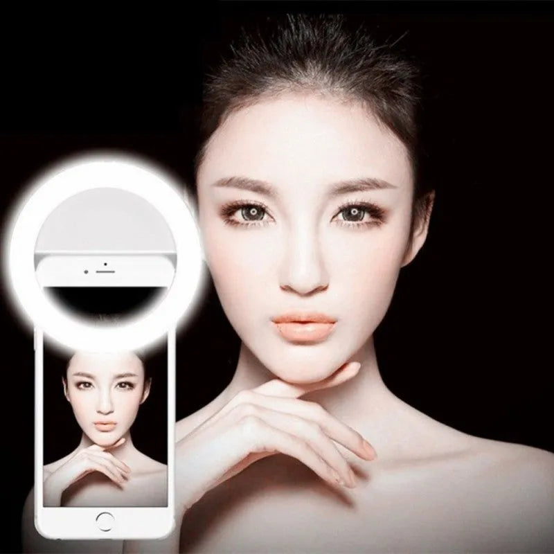 Clip-on selfie ring light attached to mobile phone for photography lighting