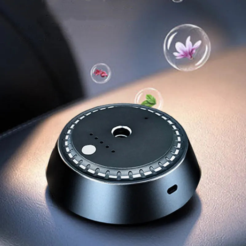 Black metal car aroma diffuser measuring 9cm by 4.5cm with USB connection