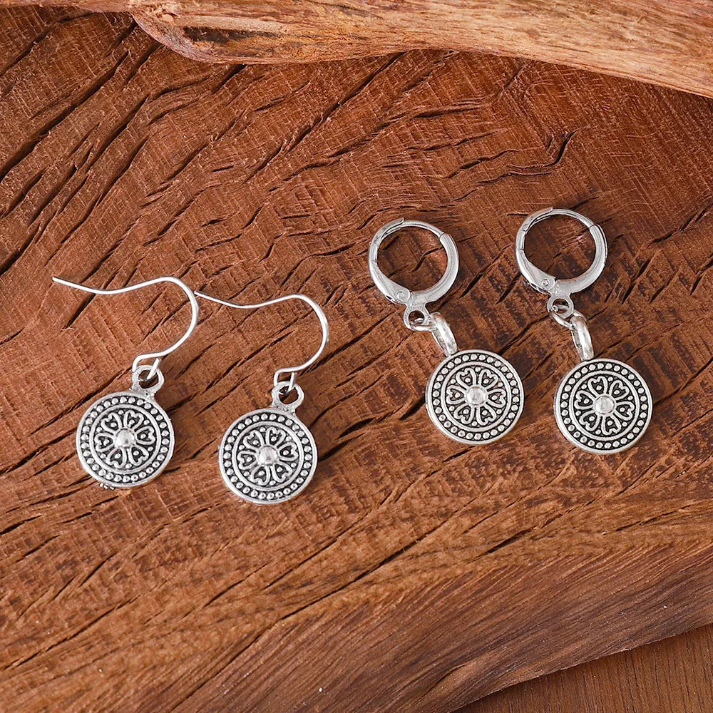 Women's bohemian retro earrings with distressed ethnic round print design in geometric shape