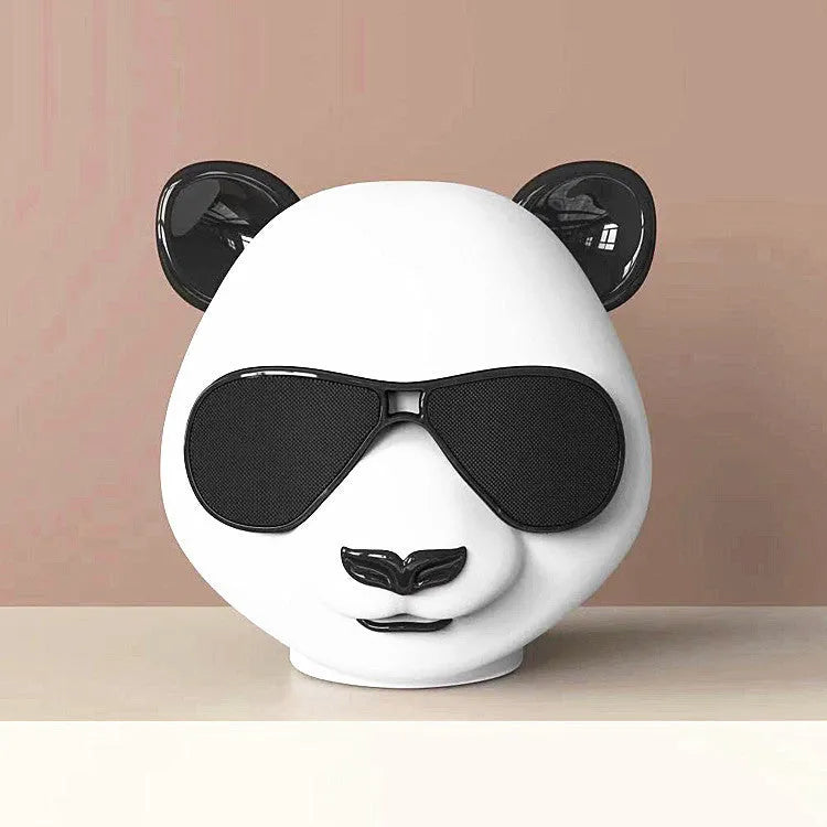 Portable mini classic style Bluetooth speaker with USB port for charging.