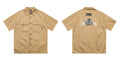 Men's plus size loose fit cotton blend work shirt with embroidered design and half sleeves