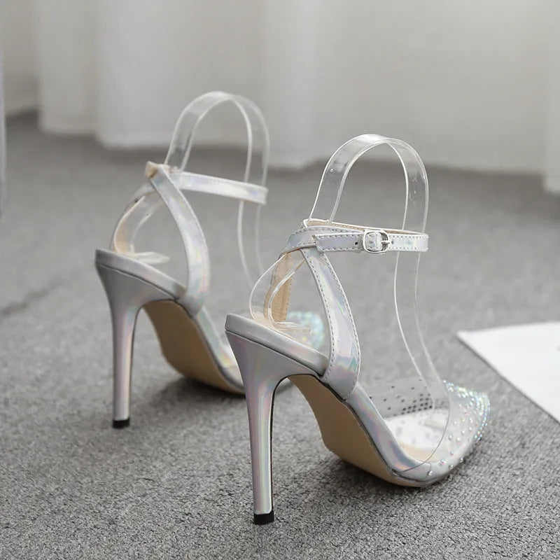 Women's pointed toe PVC sandals with diamond detail and a stiletto heel, shown in available sizes.