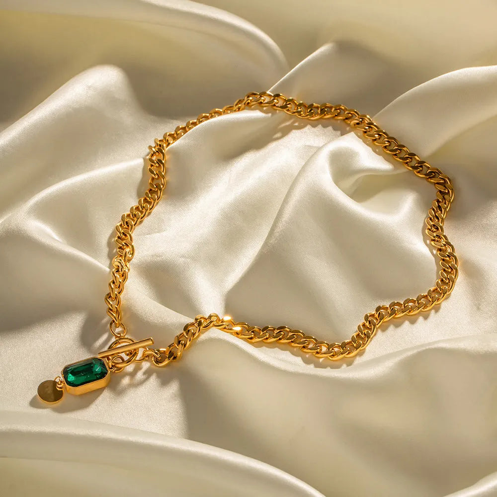 Gold French retro necklace with geometric round pendant on Cuban link chain