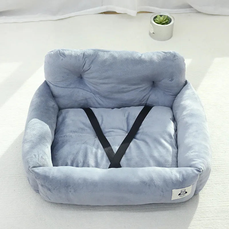 Grey and blue plaid cloth dog nest for car travel, shown in small and large sizes.