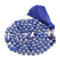 Long geometric agate tassel necklace with multi-coloured stone beads including lapis lazuli and amethyst on a 95cm chain.