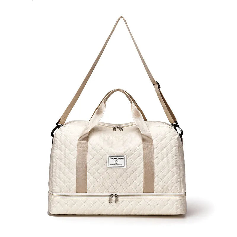 Oxford cloth leisure travel bag in a solid colour with a 36-55 litre capacity.
