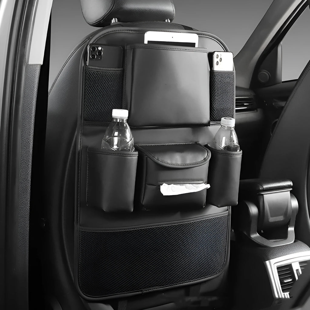 Leather car seat back storage bag hanging from a headrest, shown in brown colour.