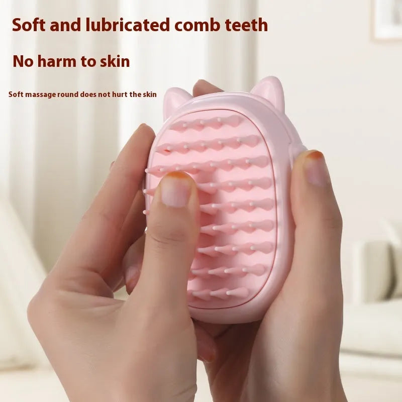 Pink and yellow ABS plastic pet comb with integrated laser pointer for cats and dogs.