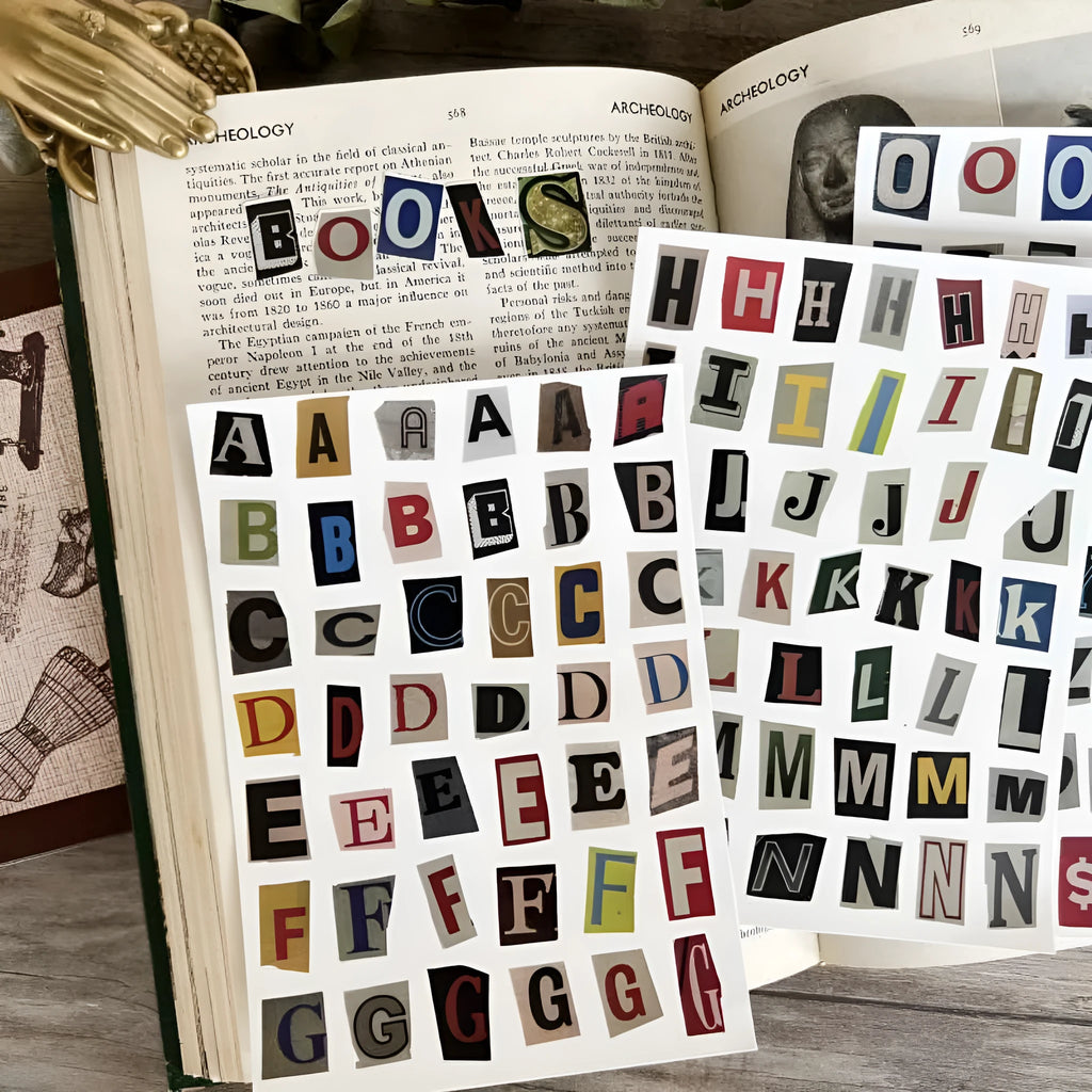 Set of cute style printed stickers featuring English letters, numbers, symbols, and weekday words for decoration and labelling.