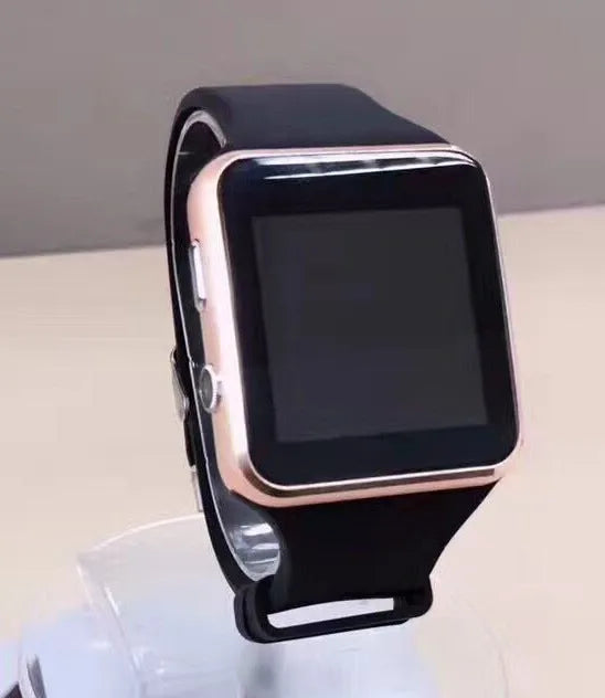 Black smart watch with 1.54 inch screen and silicone strap on a wrist