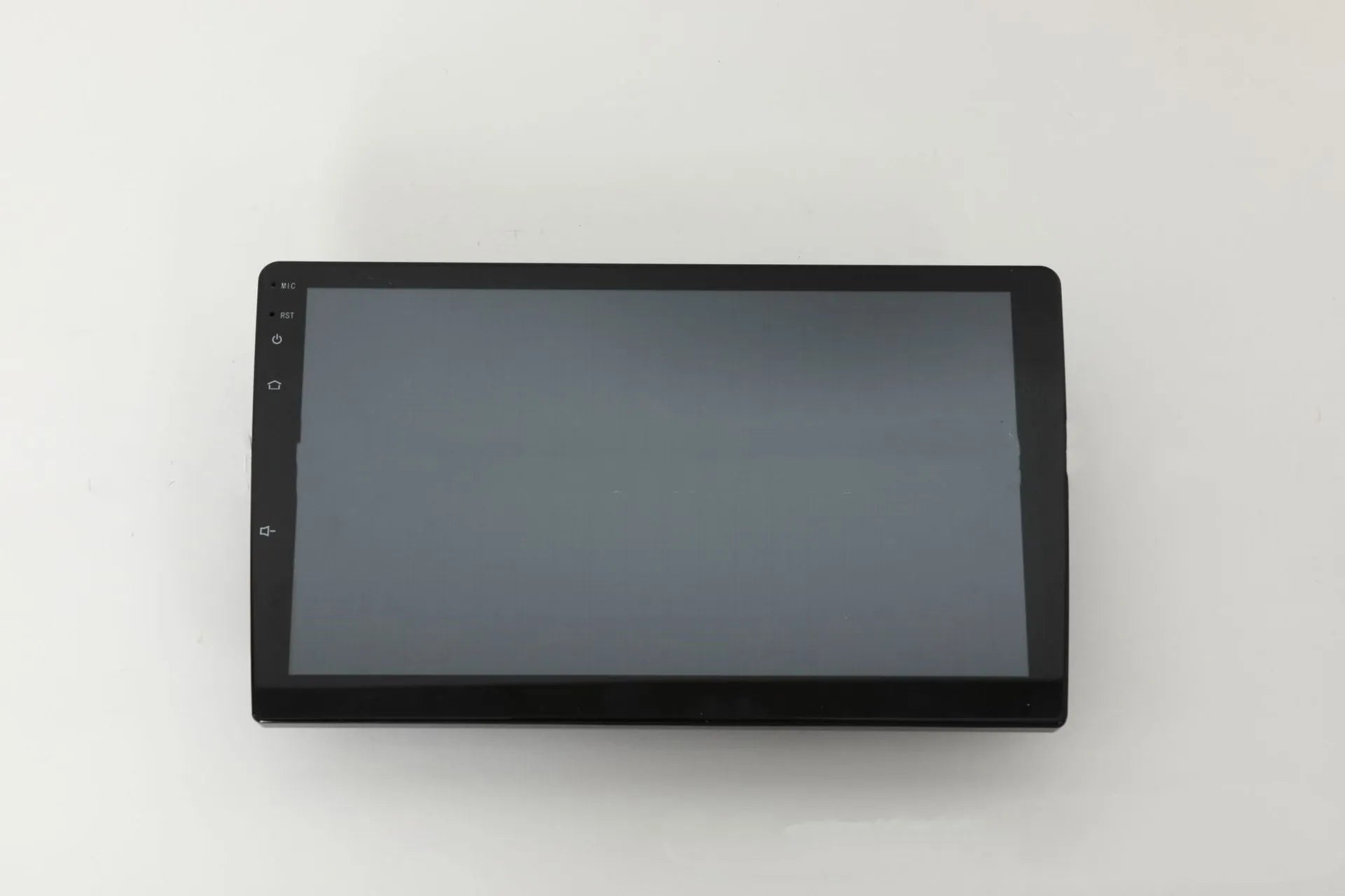 Black 10.1 inch Android car stereo touchscreen head unit with GPS antenna and connection cables