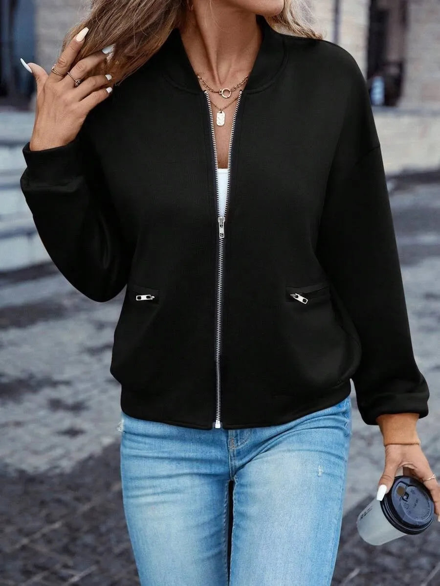 Black women's casual zip jacket with long sleeves and faux pocket detailing