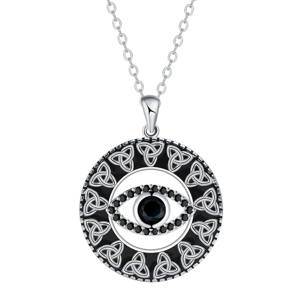 Close-up of a copper Devil's Eye pendant necklace on a cross chain for women.