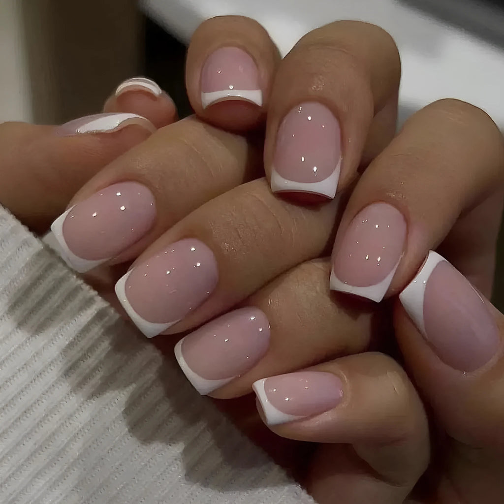 24 white square artificial nails with plaid pattern arranged in box
