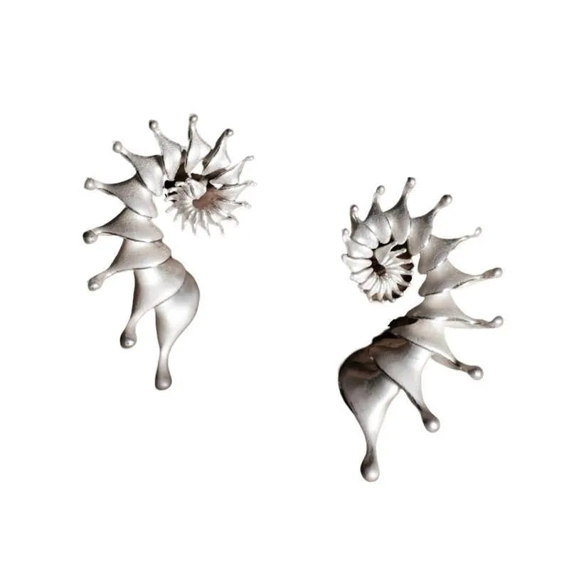 Exaggerated three-dimensional conch shell design matte earrings in alloy with electroplated finish