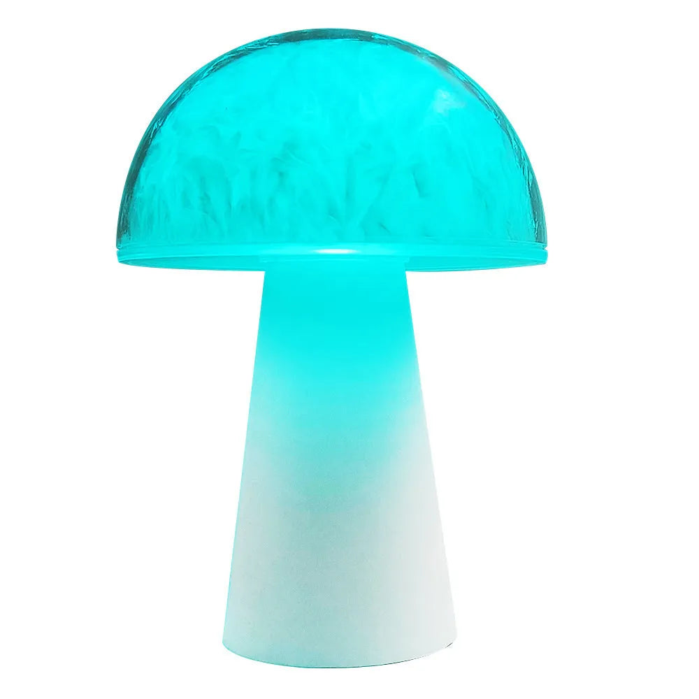 Mushroom-shaped RGB colour changing ambience lamp with remote control on wooden surface